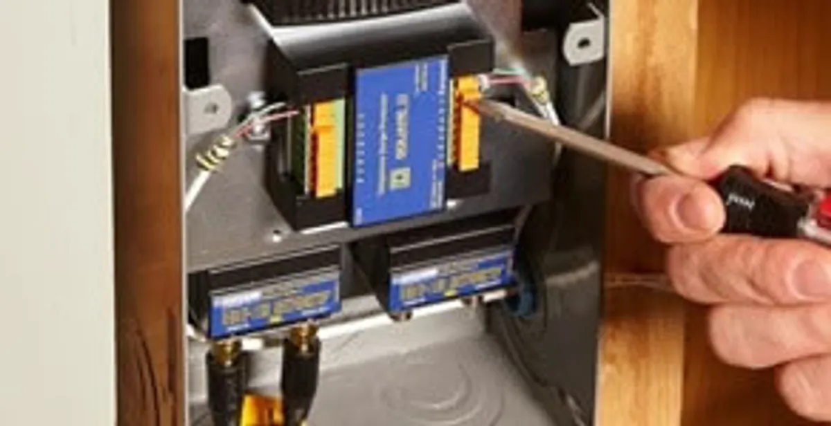 Whole home surge protection device being installed by a licensed electrician to protect electrical systems in Wilmington, NC